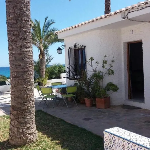 Casa al borde del mar